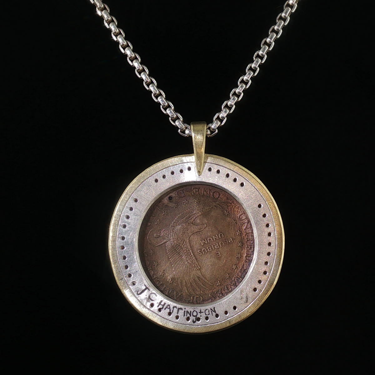 Carved Sacagawea dollar coin pendant set in silver and gold with orange diamonds, alternate view